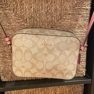 Pink Coach camera bag in good condition used 2 summers